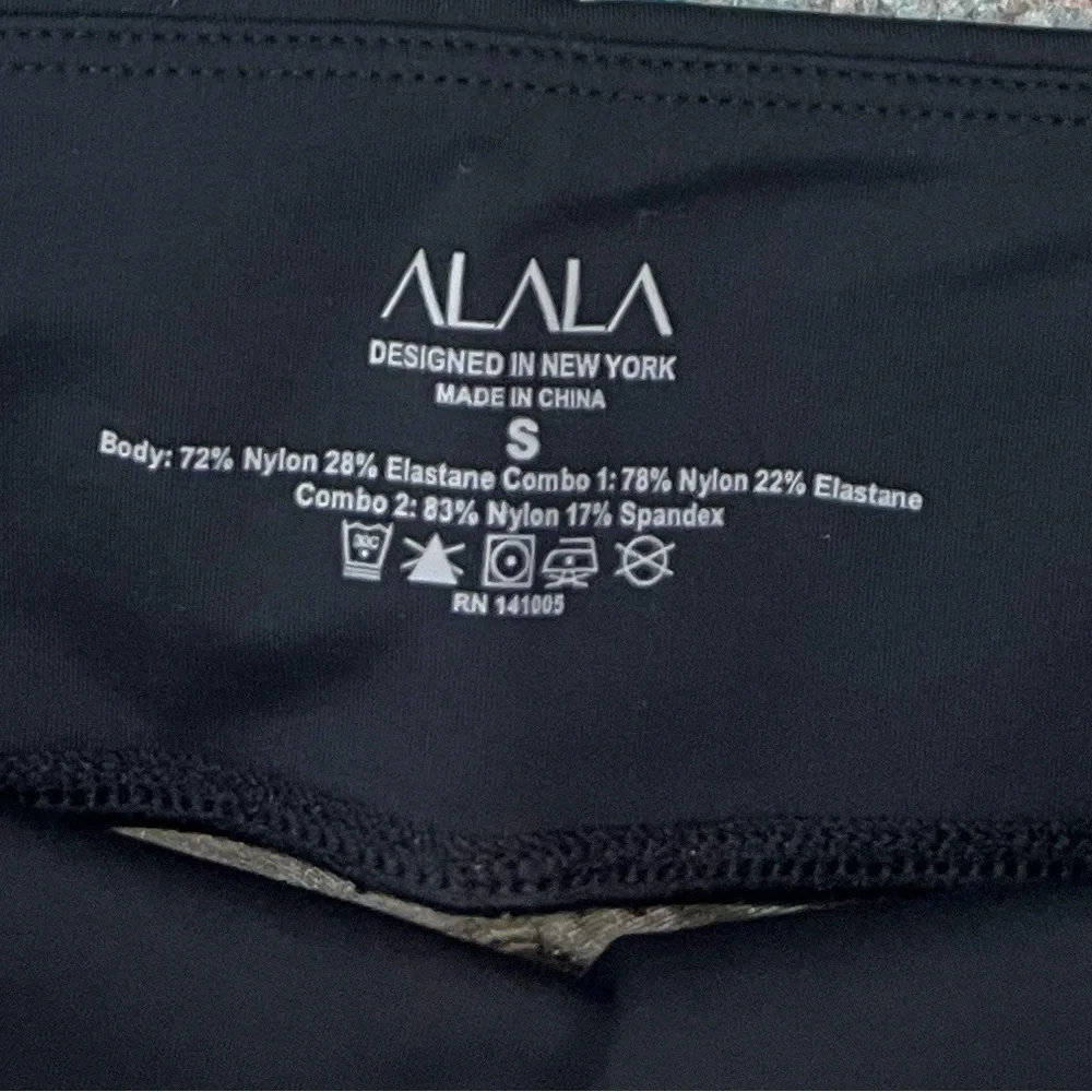 NWT Alala Bolt High Rise Bike Shorts Black/Gold/Bone - Picture 6 of 8